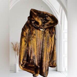 FAUX FUR  fabulous vintage mid length coat. Rhinestone closure/ elegance